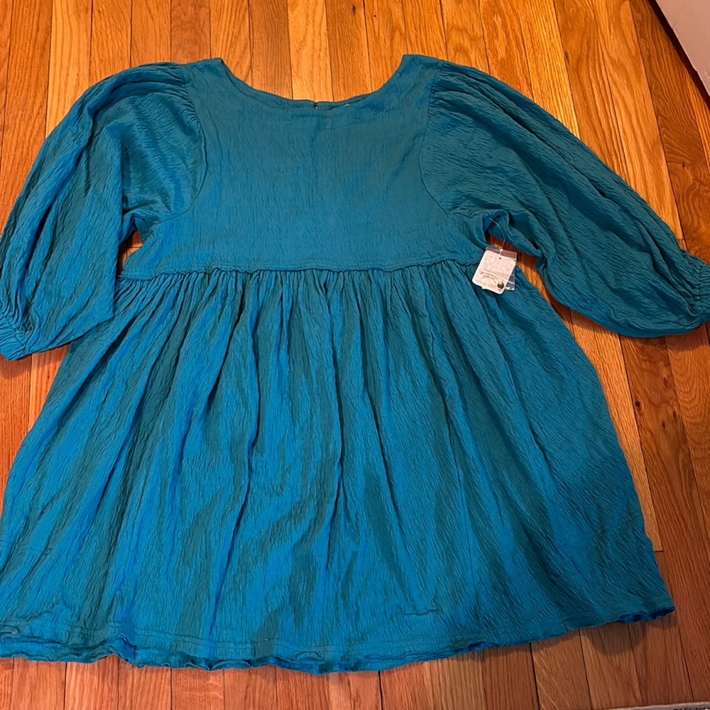 Brand new with tags free people dress / coverup size small, runs large